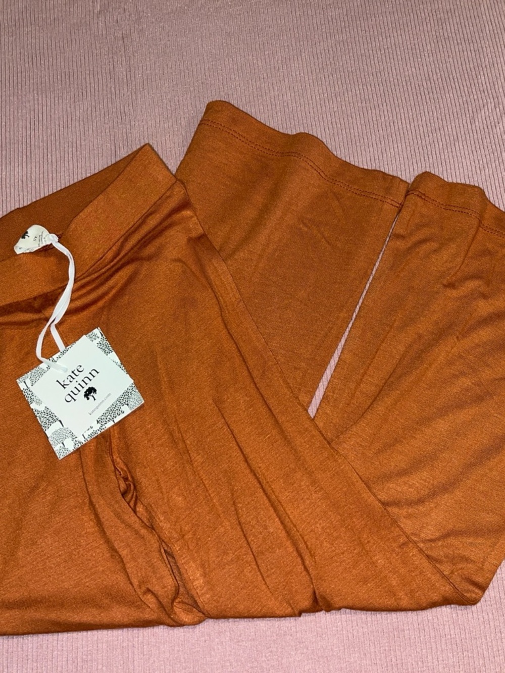 kate quinn orange/rust-colored bamboo flare pants